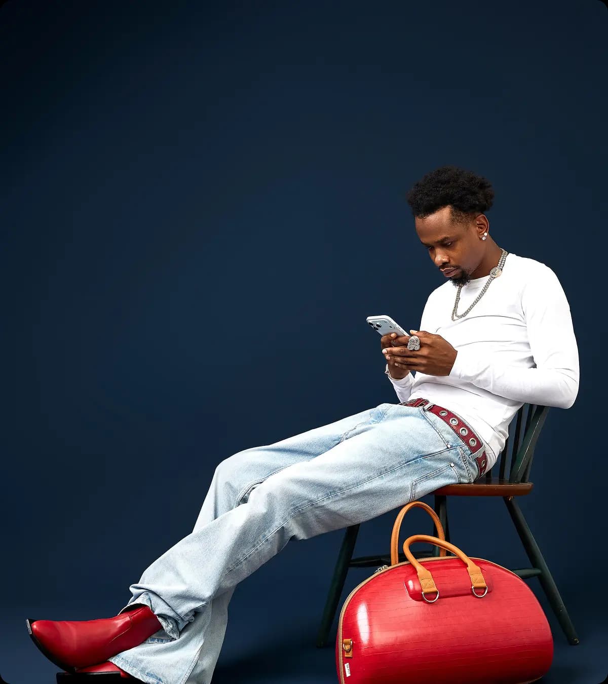 Trader checking a phone during a high-volume session